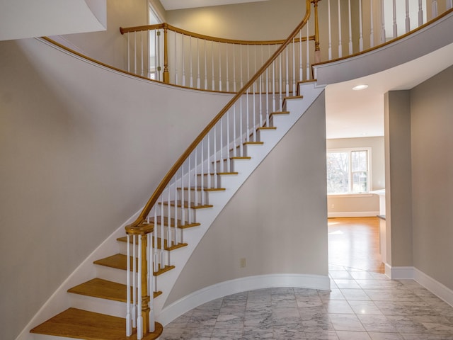 13 Longview Ter Unit 13, Madison, CT 06443 - staircase with marble finish flooring, baseboards, and a high ceiling