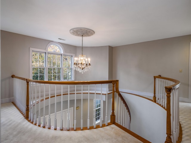 13 Longview Ter Unit 13, Madison, CT 06443 - staircase with carpet floors, baseboards, and a chandelier