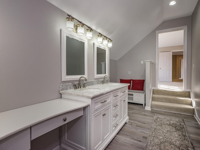 13 Longview Ter Unit 13, Madison, CT 06443 - bathroom featuring vaulted ceiling, double vanity, wood finished floors, and recessed lighting