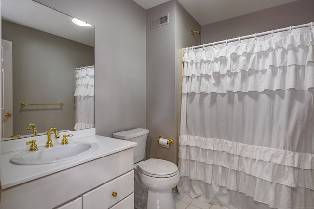 bathroom with toilet, a shower with shower curtain, tile patterned floors, and vanity