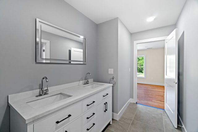 bathroom with vanity and tile patterned floors