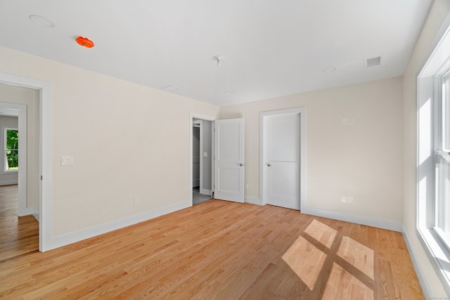 unfurnished bedroom featuring light hardwood / wood-style flooring