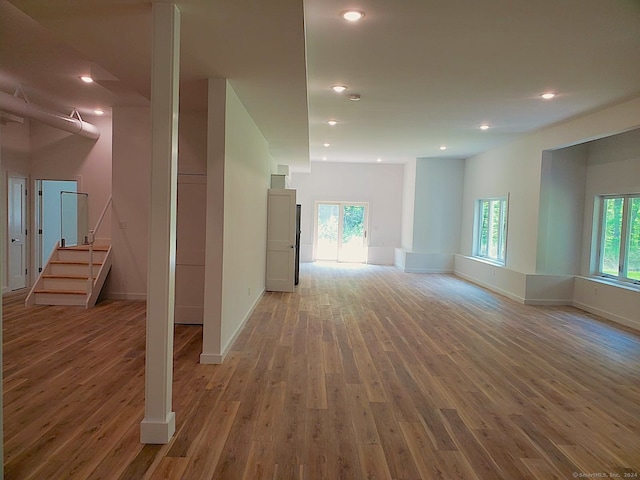 empty room featuring light hardwood / wood-style flooring and plenty of natural light