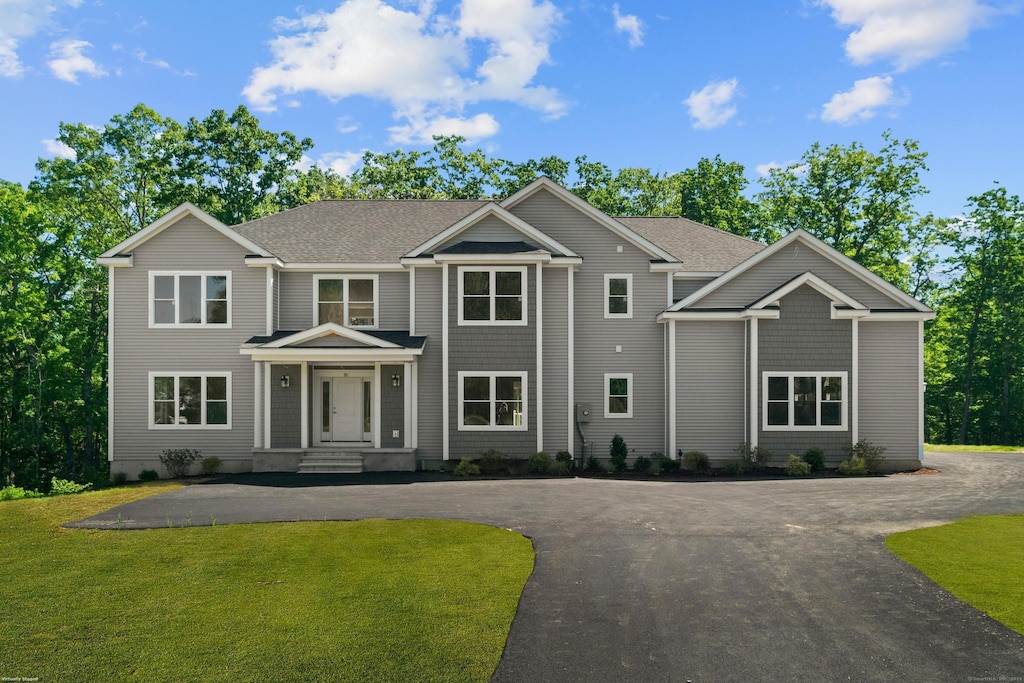 view of front of home with a front yard