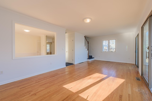 unfurnished room featuring light hardwood / wood-style flooring