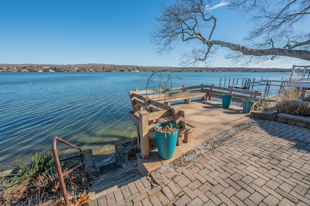 view of dock with a water view