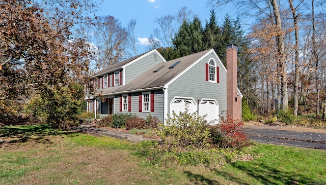 view of property exterior featuring a garage