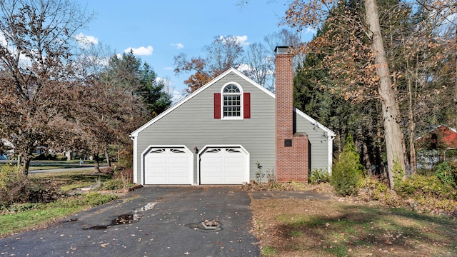 view of home's exterior featuring a garage