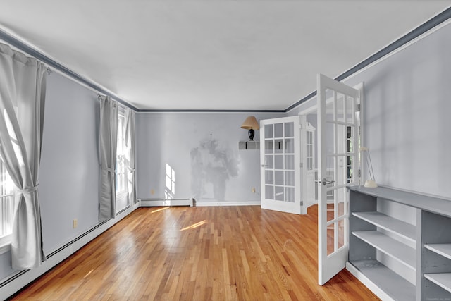 interior space with french doors, crown molding, a baseboard radiator, and light wood-type flooring