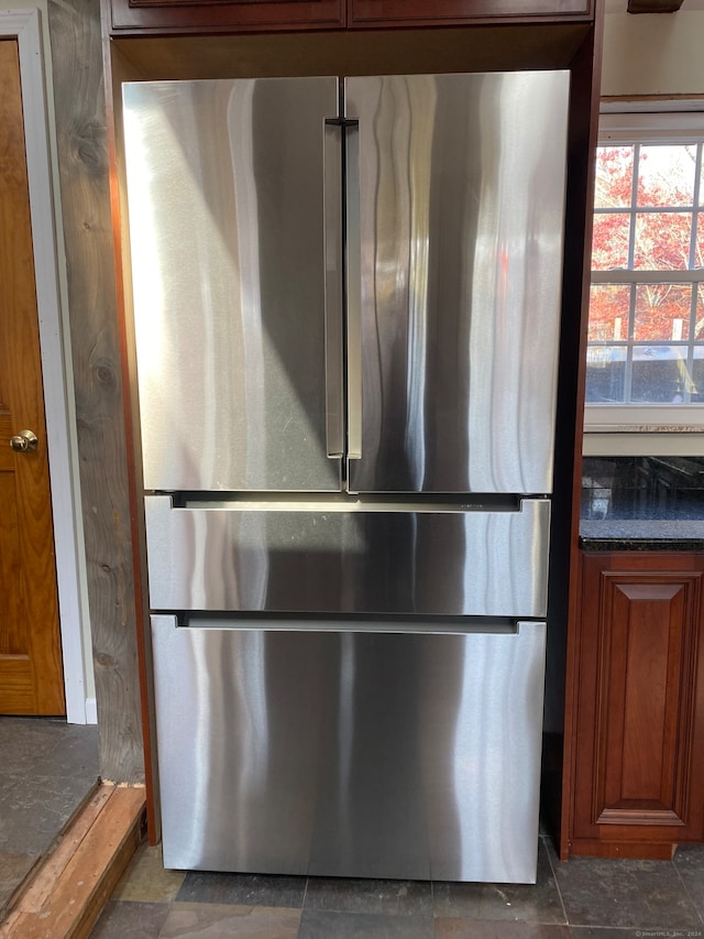 room details featuring stainless steel fridge