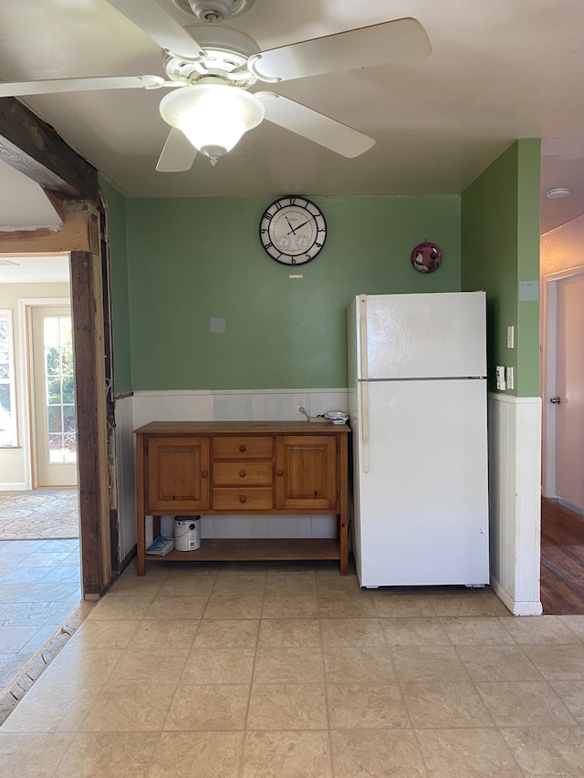 kitchen with ceiling fan and white fridge