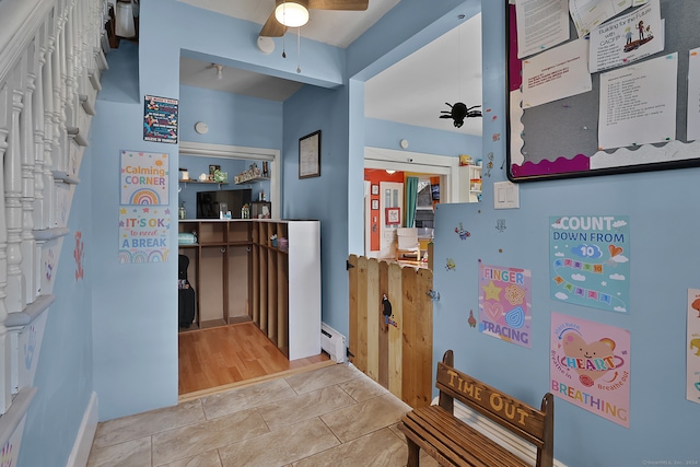 interior space featuring light hardwood / wood-style flooring and baseboard heating