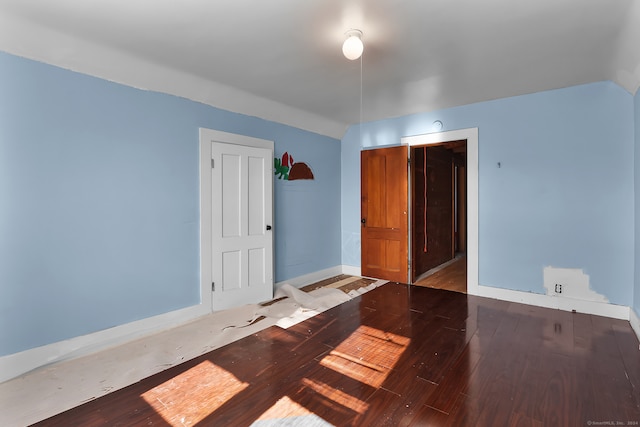 unfurnished room featuring hardwood / wood-style flooring