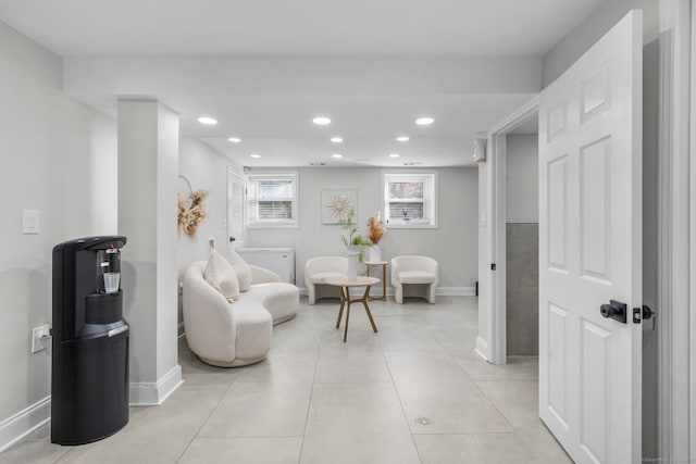 living area with light tile patterned floors