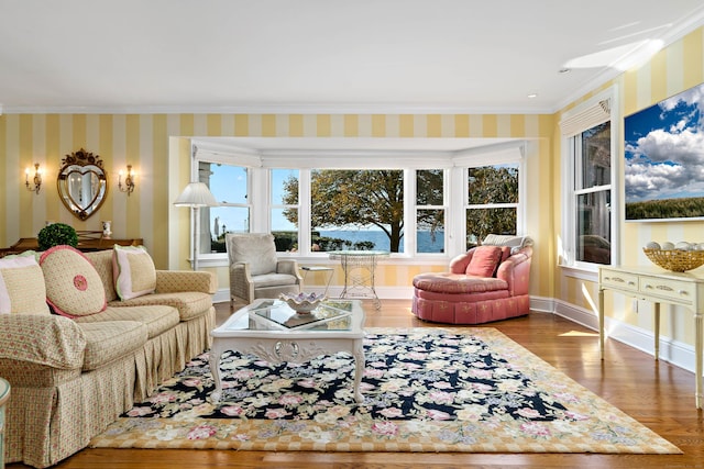 living room with ornamental molding and wood-type flooring