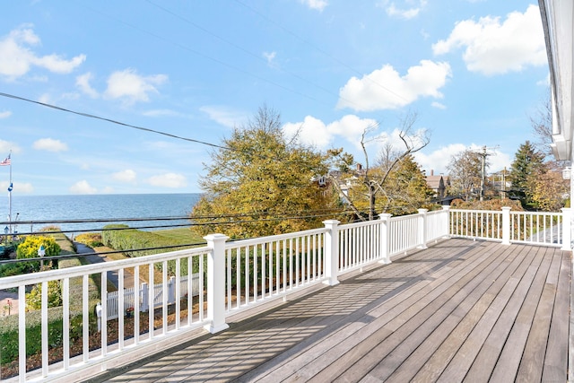 wooden terrace with a water view