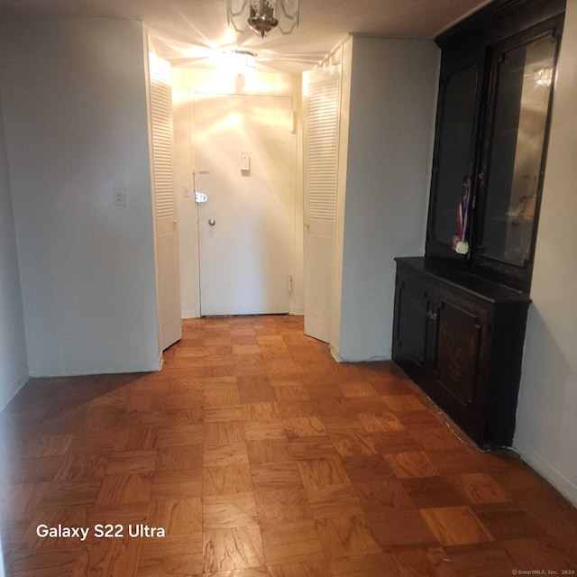 corridor with parquet flooring