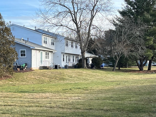 view of yard with central AC