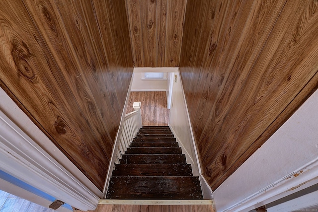 staircase featuring hardwood / wood-style flooring