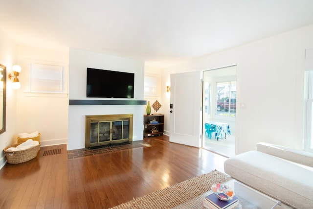 living room featuring dark hardwood / wood-style flooring