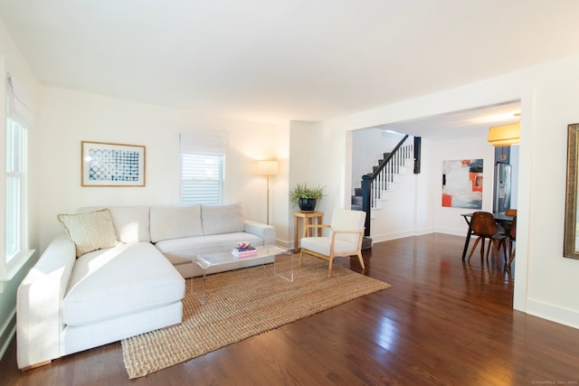 living room featuring dark hardwood / wood-style floors