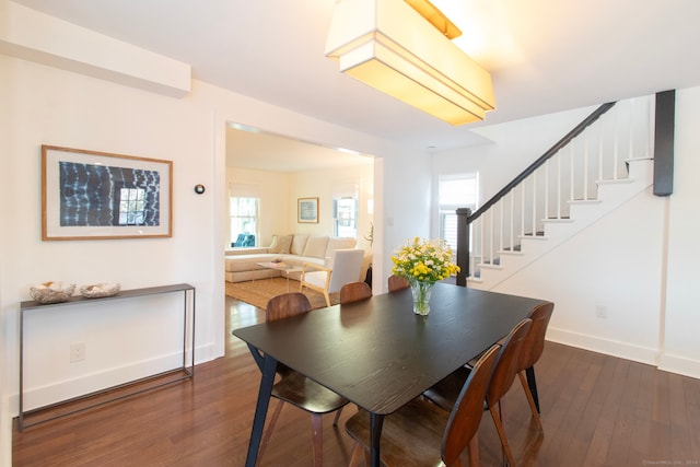 dining area featuring dark hardwood / wood-style flooring