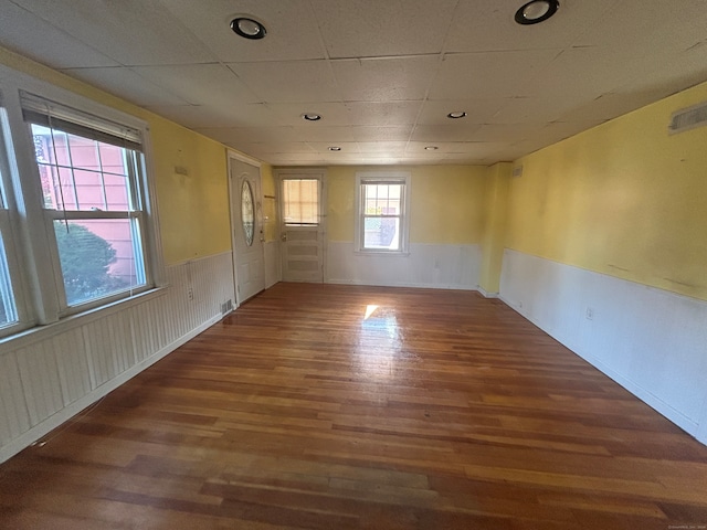 spare room with dark wood-type flooring