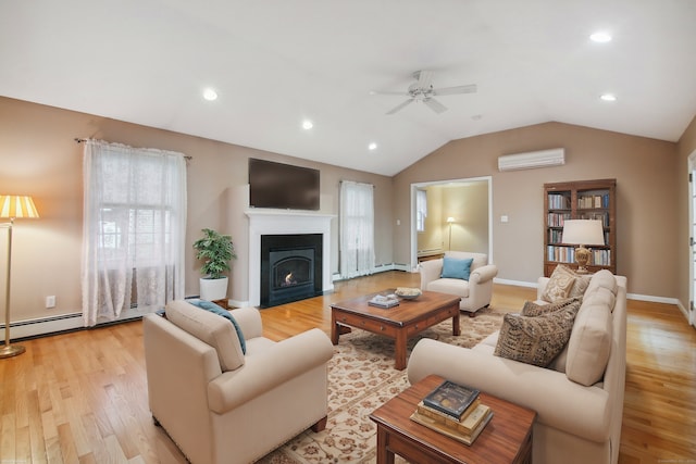 living room featuring a baseboard radiator, lofted ceiling, light wood-type flooring, ceiling fan, and a wall unit AC