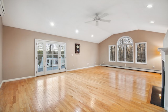 unfurnished living room featuring ceiling fan, lofted ceiling, light hardwood / wood-style floors, and a baseboard heating unit