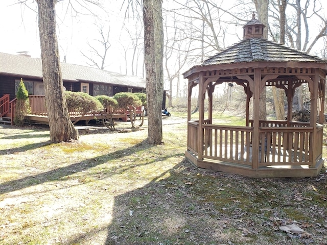 view of yard with a gazebo and a deck