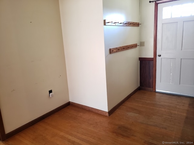 hallway featuring hardwood / wood-style flooring