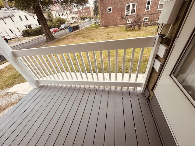 wooden deck with a yard