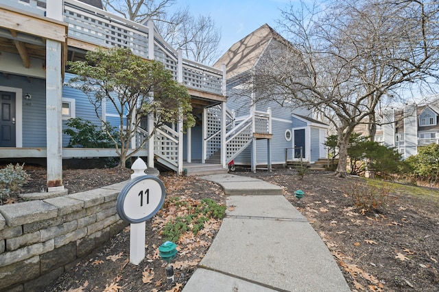 exterior space featuring a wooden deck