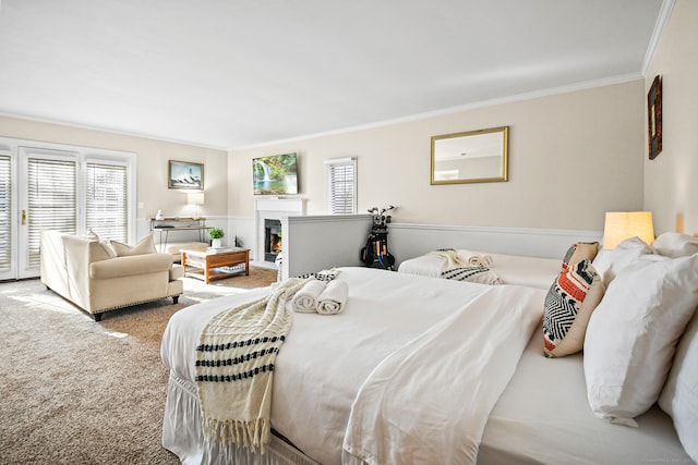 bedroom featuring carpet flooring and ornamental molding