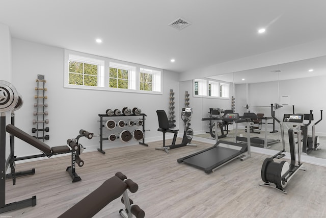 gym with light wood-type flooring