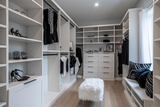 walk in closet featuring light wood-type flooring