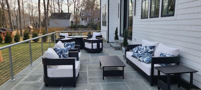 view of patio / terrace featuring outdoor lounge area and a balcony