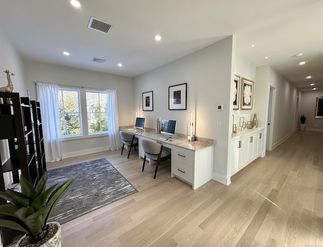 office space featuring light wood-type flooring