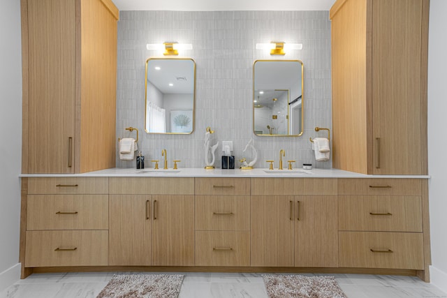 bathroom featuring vanity and decorative backsplash