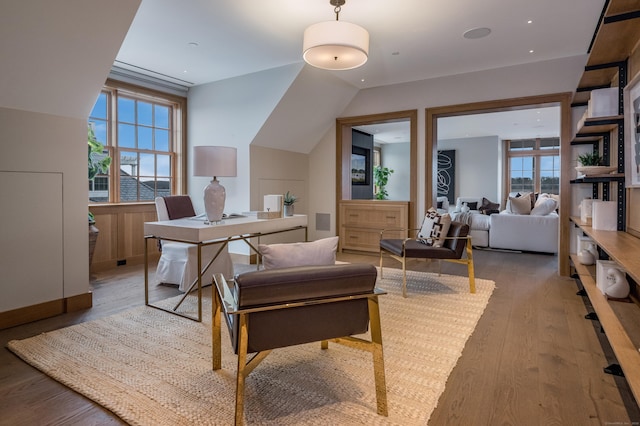 office featuring hardwood / wood-style flooring and lofted ceiling