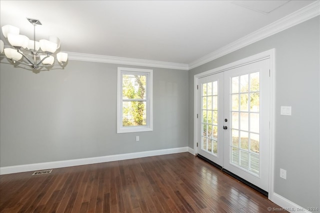 interior space with ornamental molding, french doors, dark wood-type flooring, and plenty of natural light