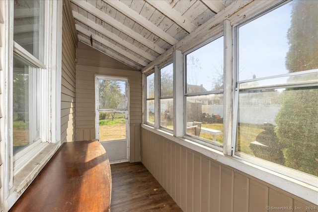 unfurnished sunroom with vaulted ceiling with beams and wooden ceiling