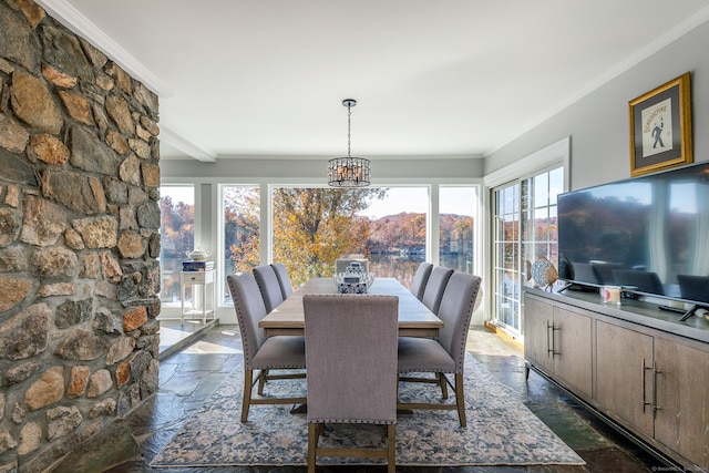 dining space featuring beamed ceiling, a chandelier, and crown molding