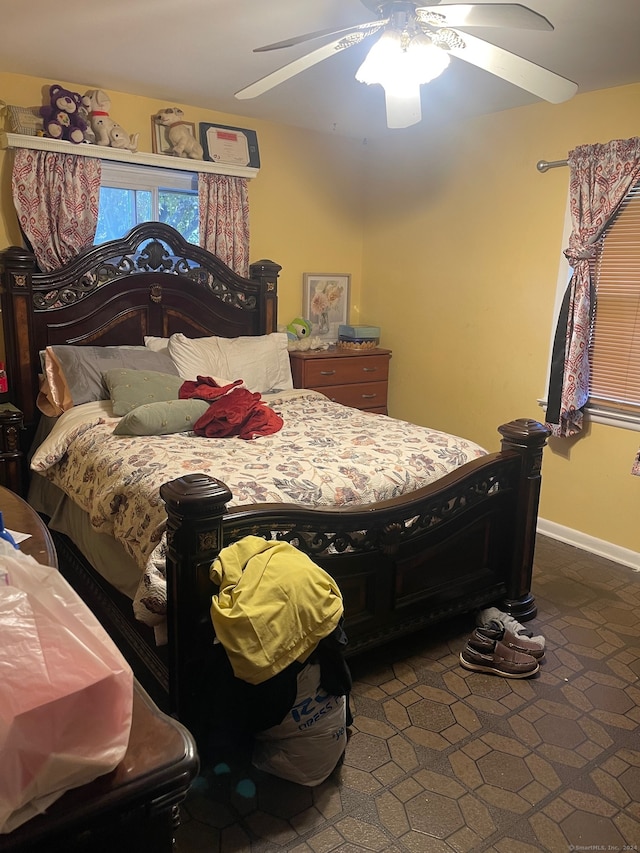 bedroom featuring ceiling fan