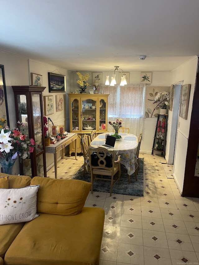 dining space featuring a notable chandelier