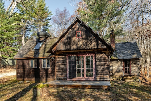51 Wykeham Rd, Washington, CT 06793 - back of house with a chimney and a wooden deck