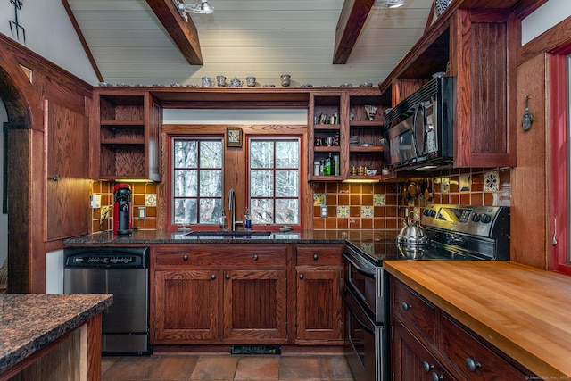 kitchen with vaulted ceiling with beams, decorative backsplash, black appliances, sink, and butcher block countertops