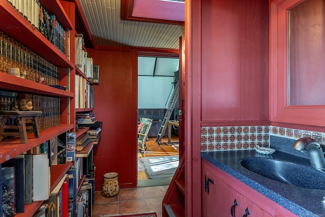 bathroom featuring vanity and tile patterned flooring