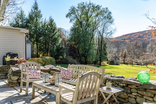 view of patio with a mountain view