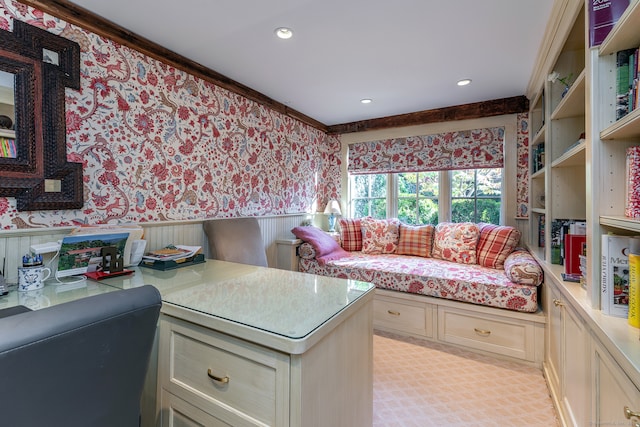 kitchen featuring cream cabinets and crown molding